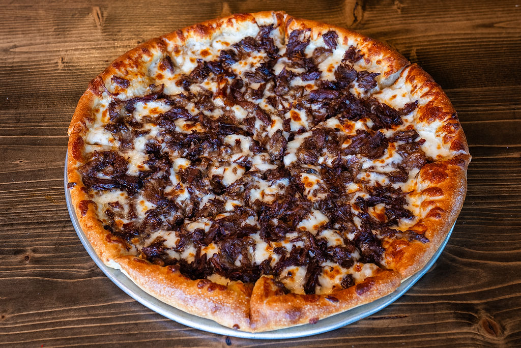 Tasso Kabrit (Fried Goat) Pizza